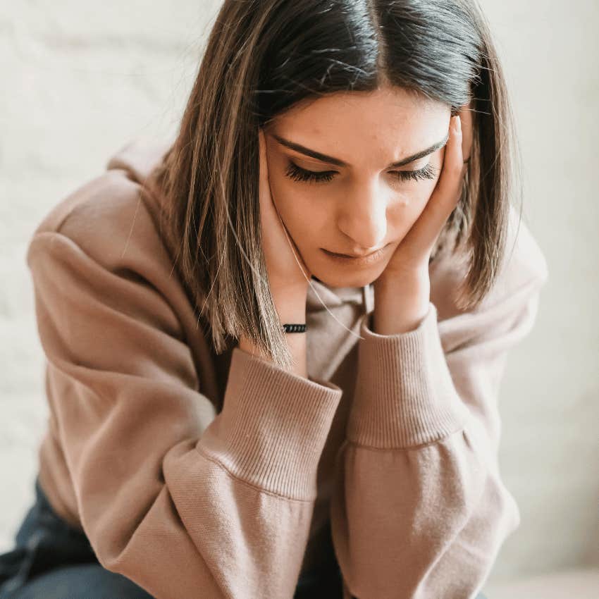 sad woman looking down