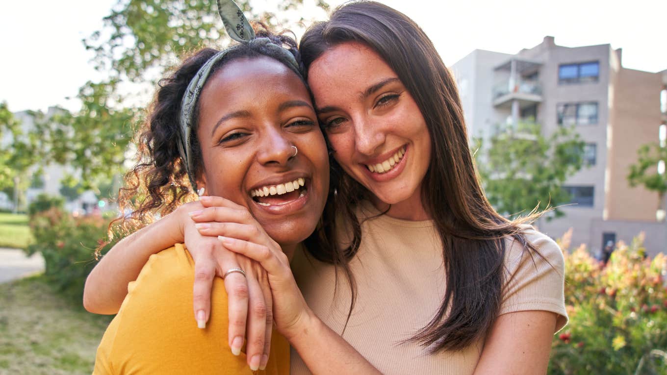 Signs Someone In Your Life Is A Good Person two friends smiling and hugging