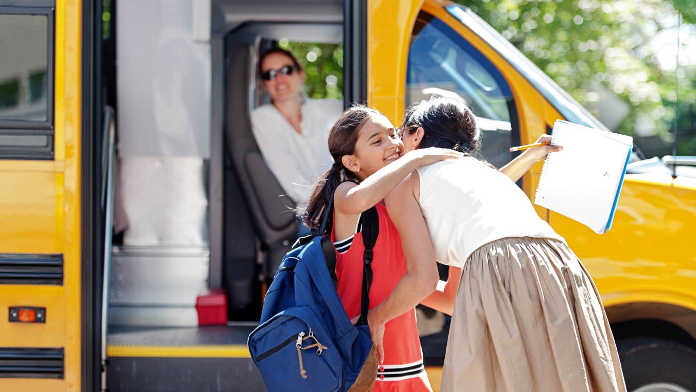 3 Back-To-School Traditions A Teacher Mom Does With Her Kids Each Year kid getting on the school bus