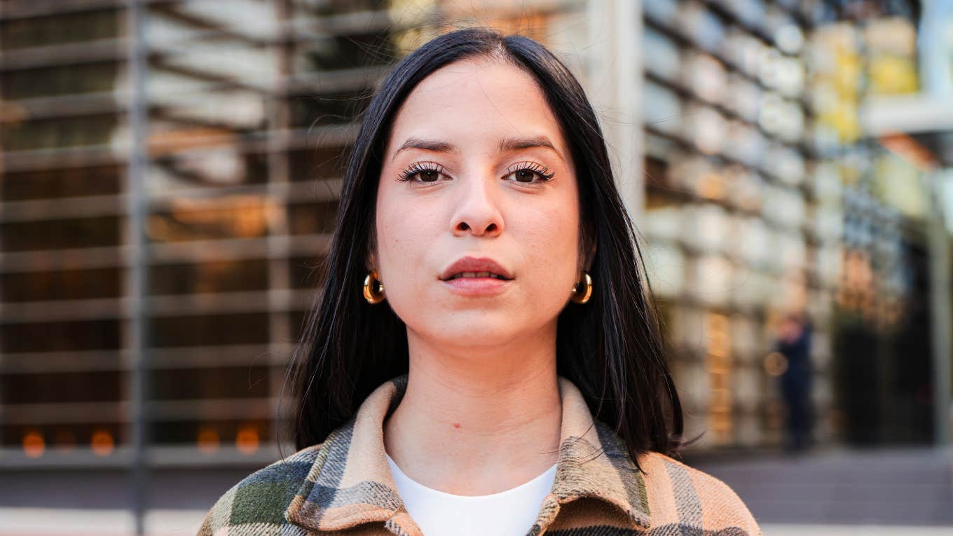 Things Truly Authentic People Find Irritating, According To Psychology authentic woman looking annoyed with someone's behavior