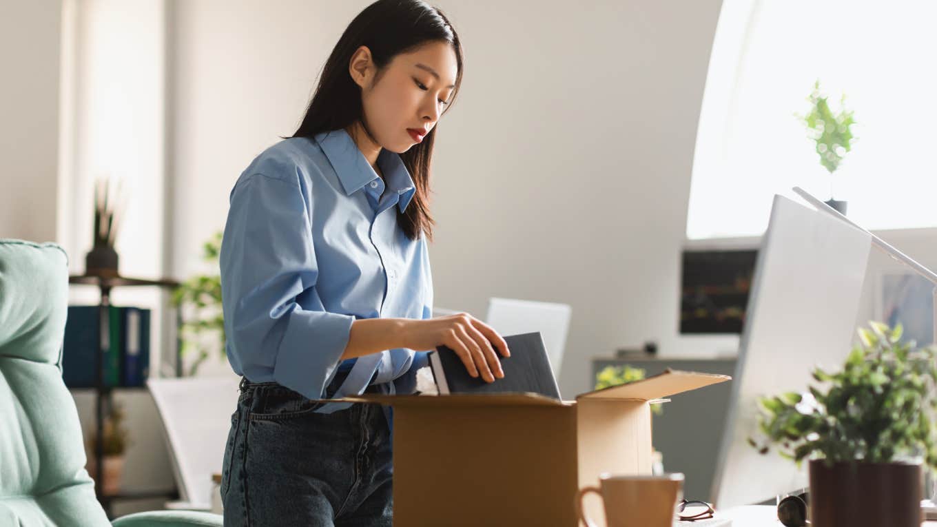 Worker Says She Put In Her 2-Week Notice Only To Get Fired On The Spot fired employee packing belongings in cardboard box