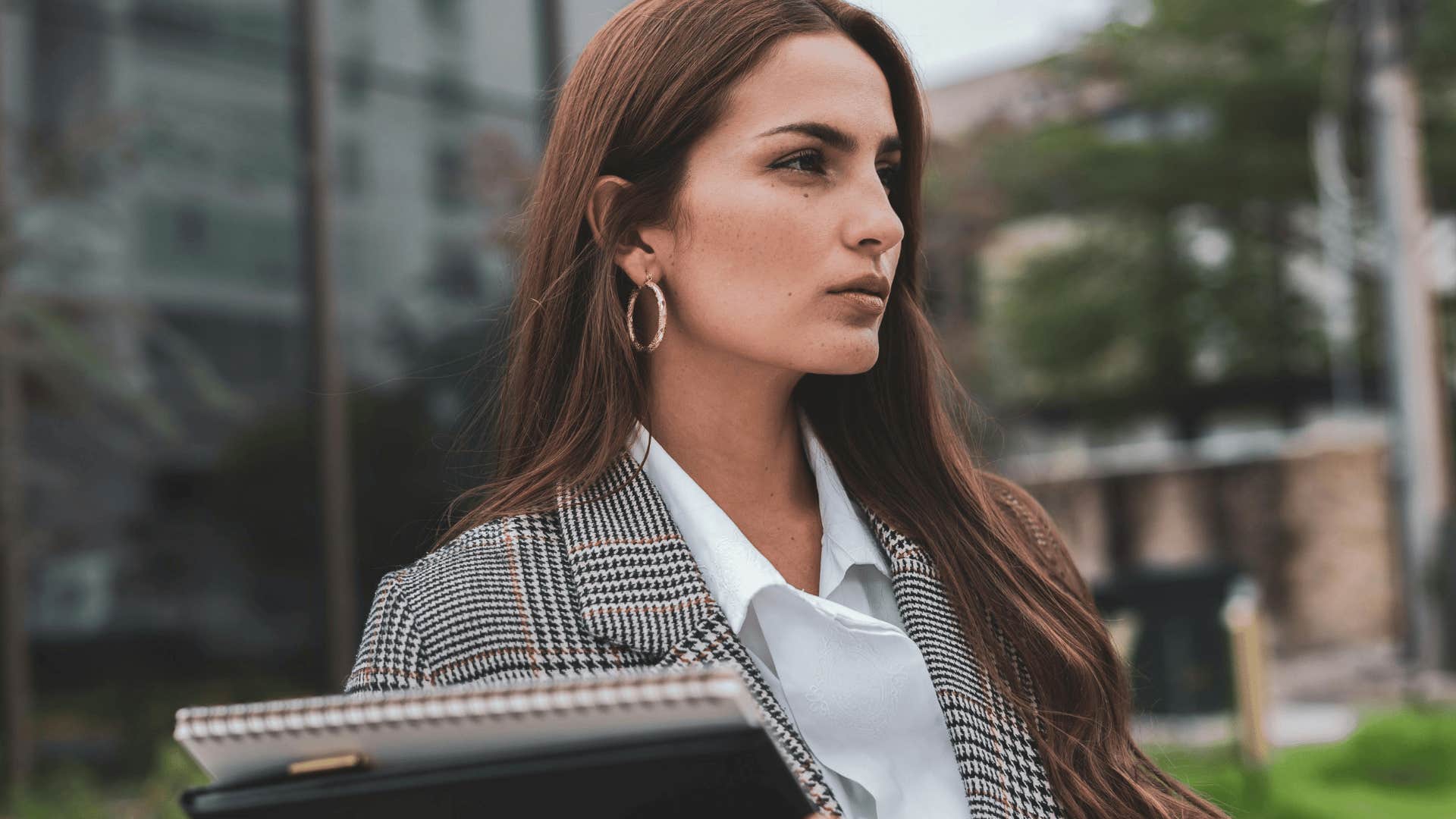 confident businesswoman outdoors