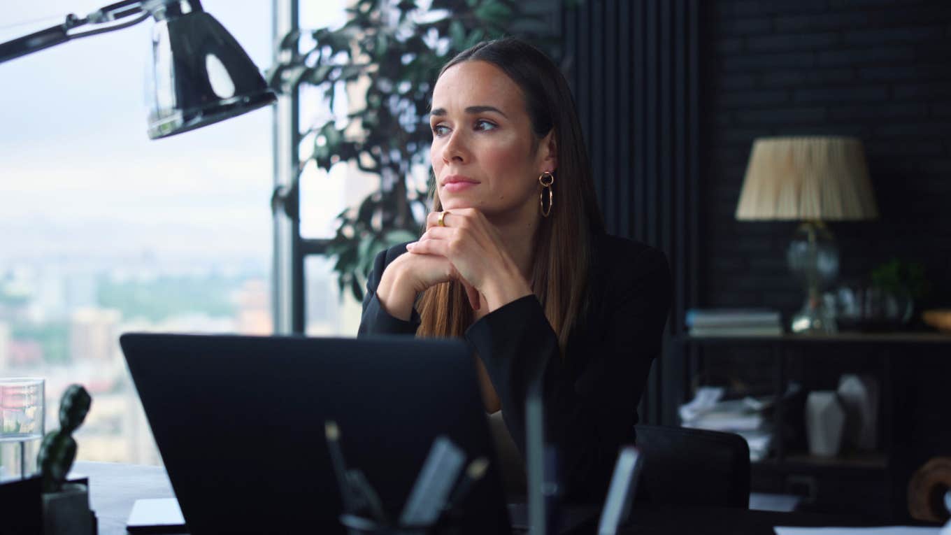 Burnt Out Worker Doesn't See The Point Of Taking PTO Woman at work feeling burnt out and unmotivated