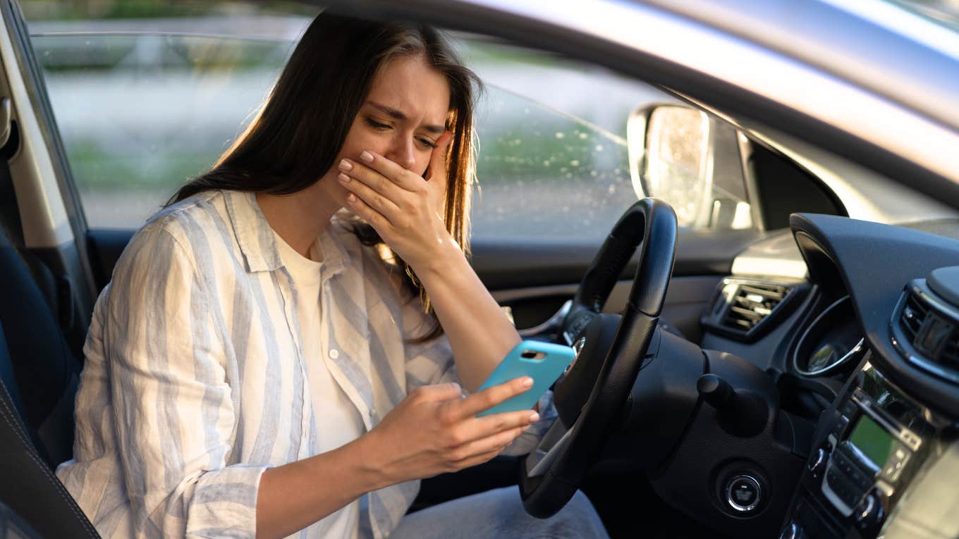 The Cruelest Thing My Husband Did When I Left Him Woman crying after receiving text from husband, now former husband.