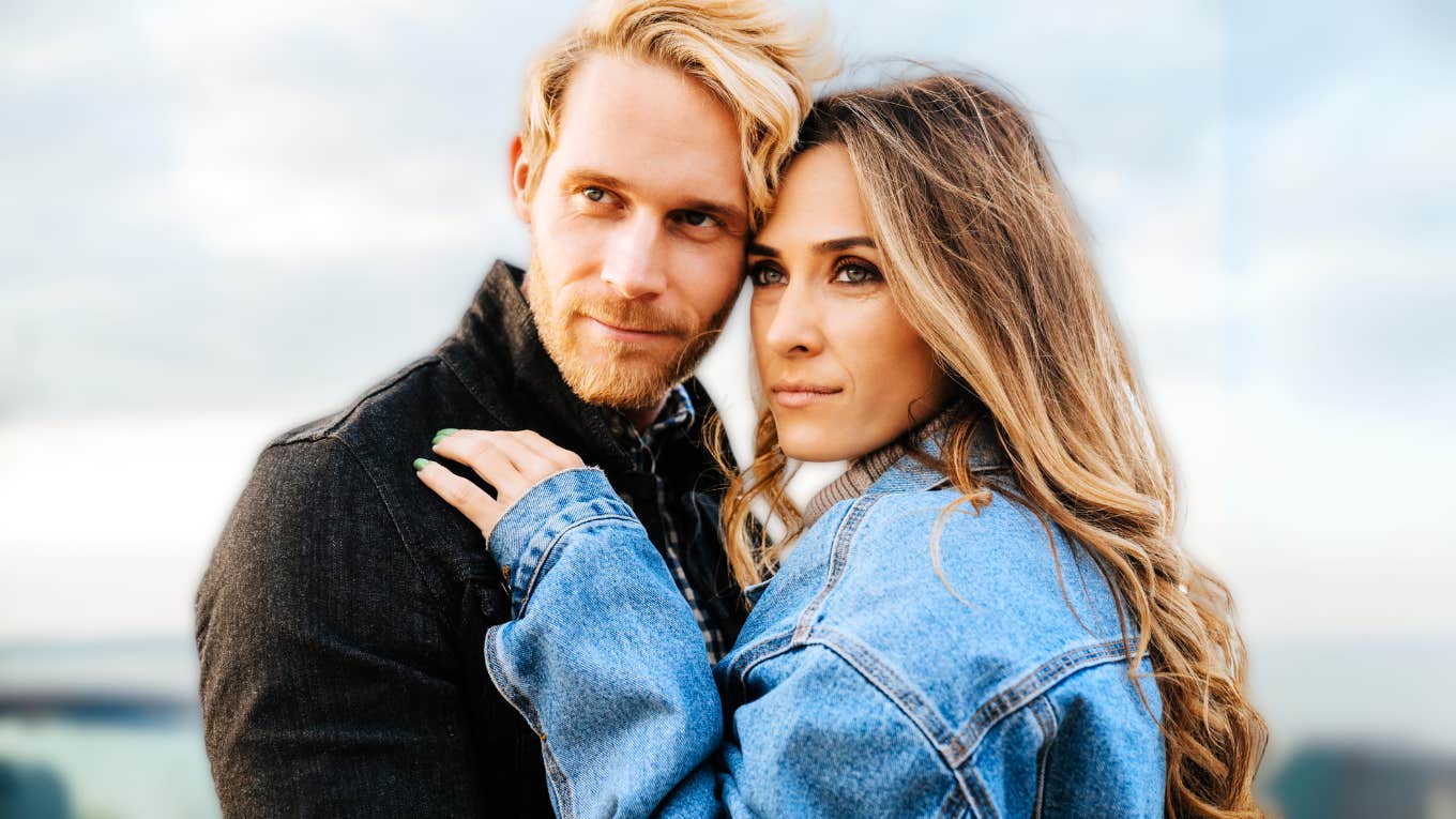 7 Love Experts Reveal The #1 Way To Make A Man Fall For You Man falling for woman, quietly gazing out.