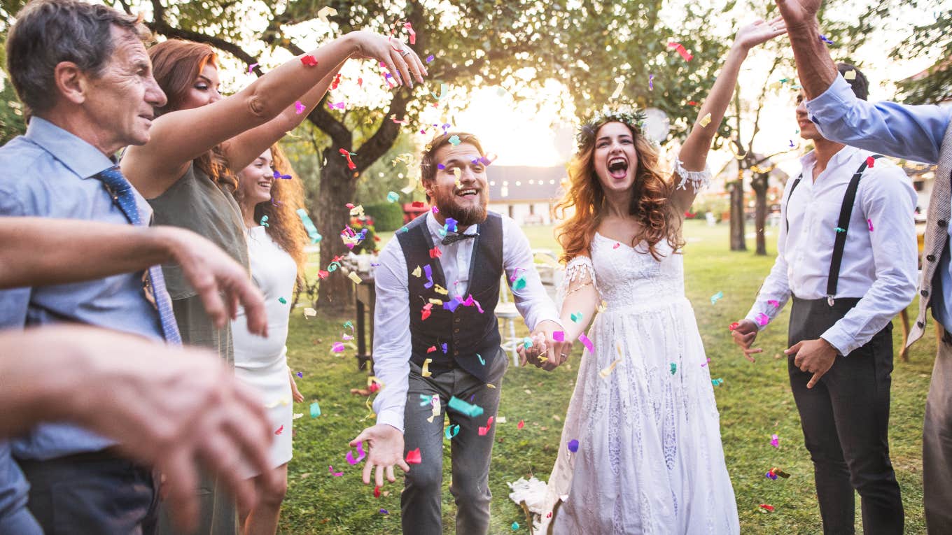 Photographer Claims Weddings Will Go Extinct By 2030 Happy bride and groom at micro-wedding