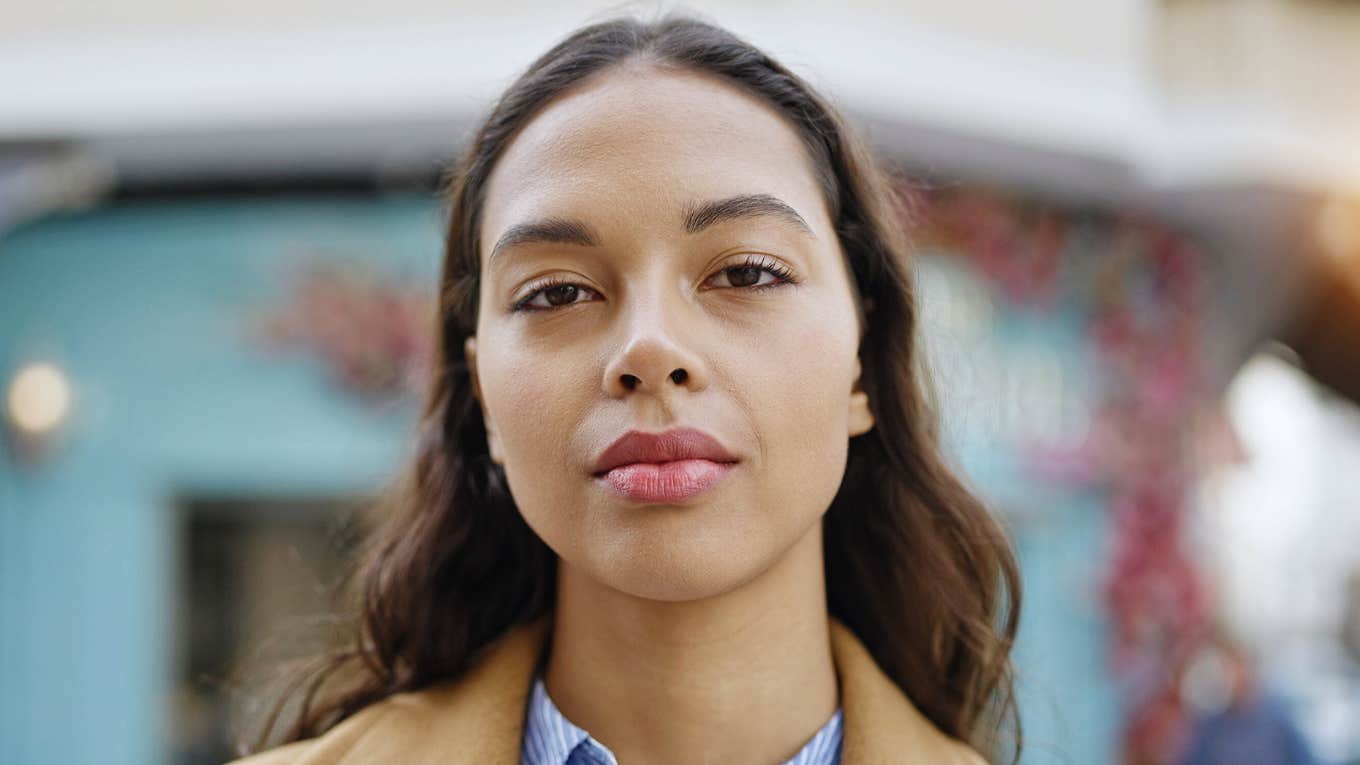 Phrases People Use When They Secretly Don't Like You serious woman