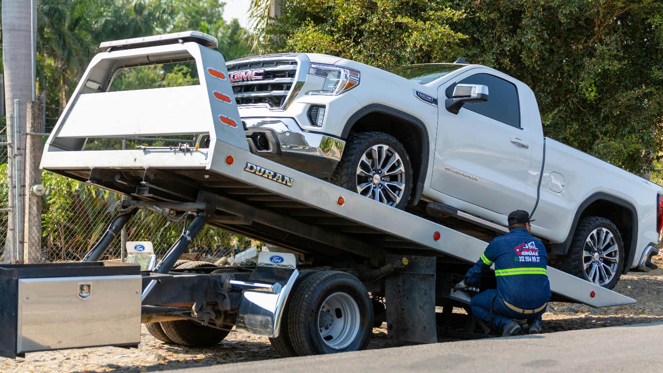Police Search For Brooklyn Man Who Stole A Tow Truck During Vehicle Tow Vehicle getting towed for being illegally parked