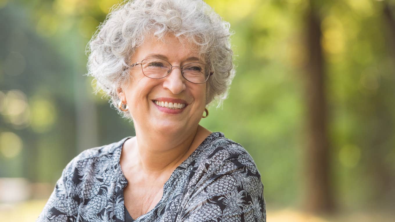 Retired Teacher Spent A Year Saving Bingo Winnings To Buy Supplies For Her Local Elementary School elderly woman smiling while sitting outside