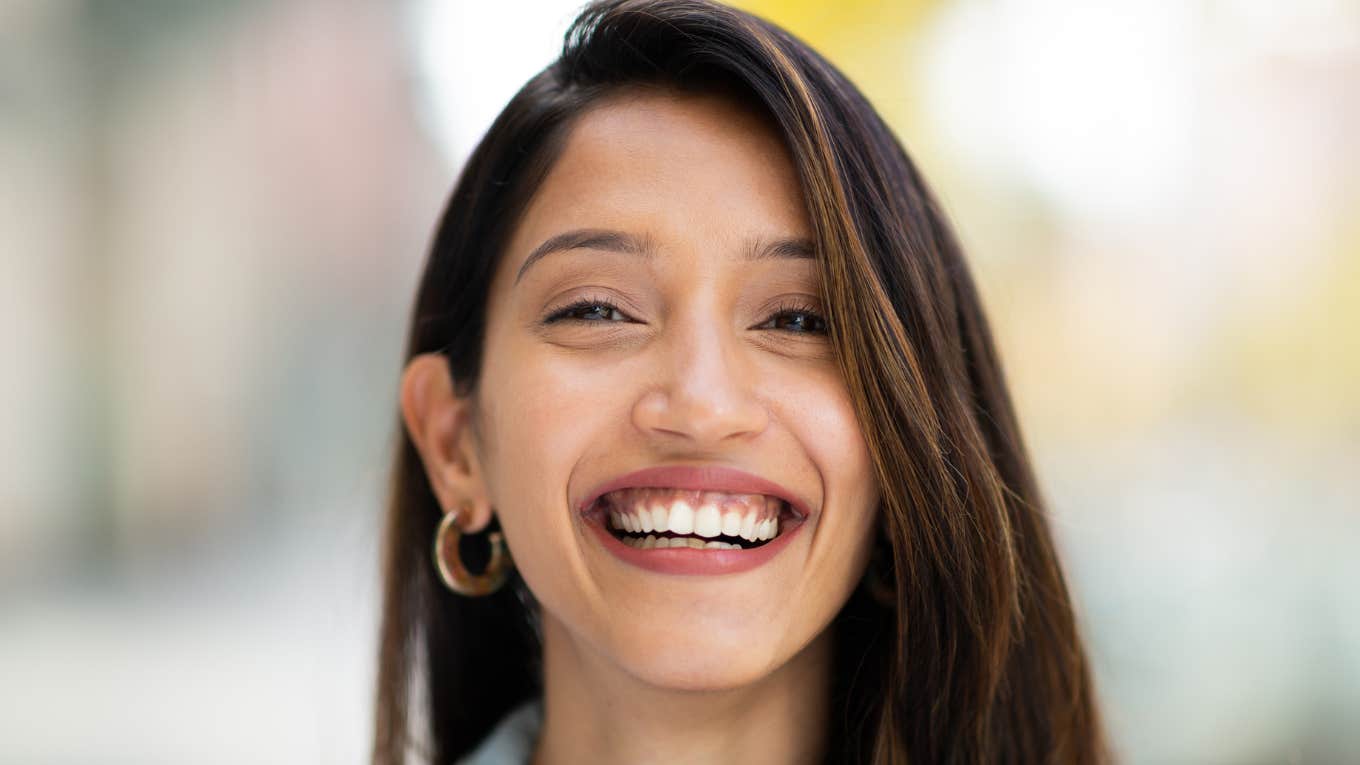 Signs Of A Genuinely Classy Person That Can't Be Faked happy smiling woman