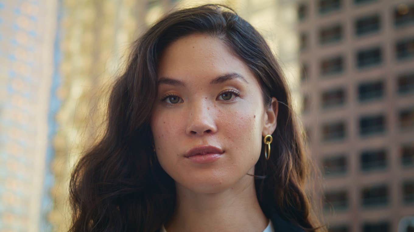 Signs Someone Is Highly Intelligent Even Though They Try To Hide It pretty and serious woman close up