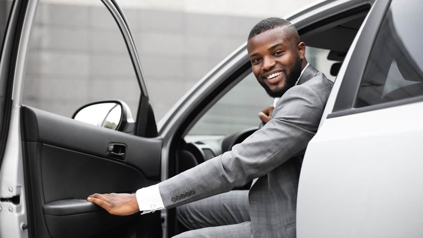 Students Raise Over $20K To Buy Their High School Janitor His Dream Car man getting into new car