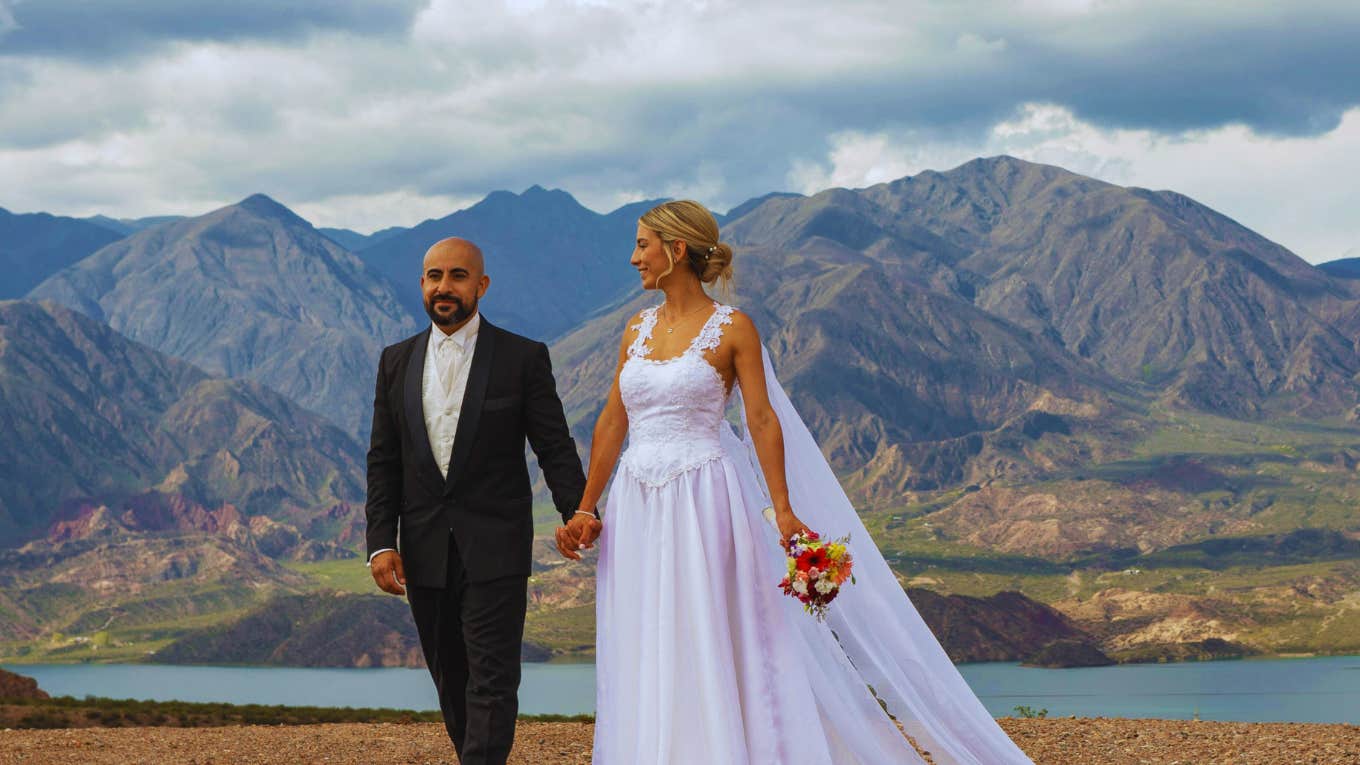 Most Unique Wedding Locations Around The World Couple has a unique wedding location in nature.