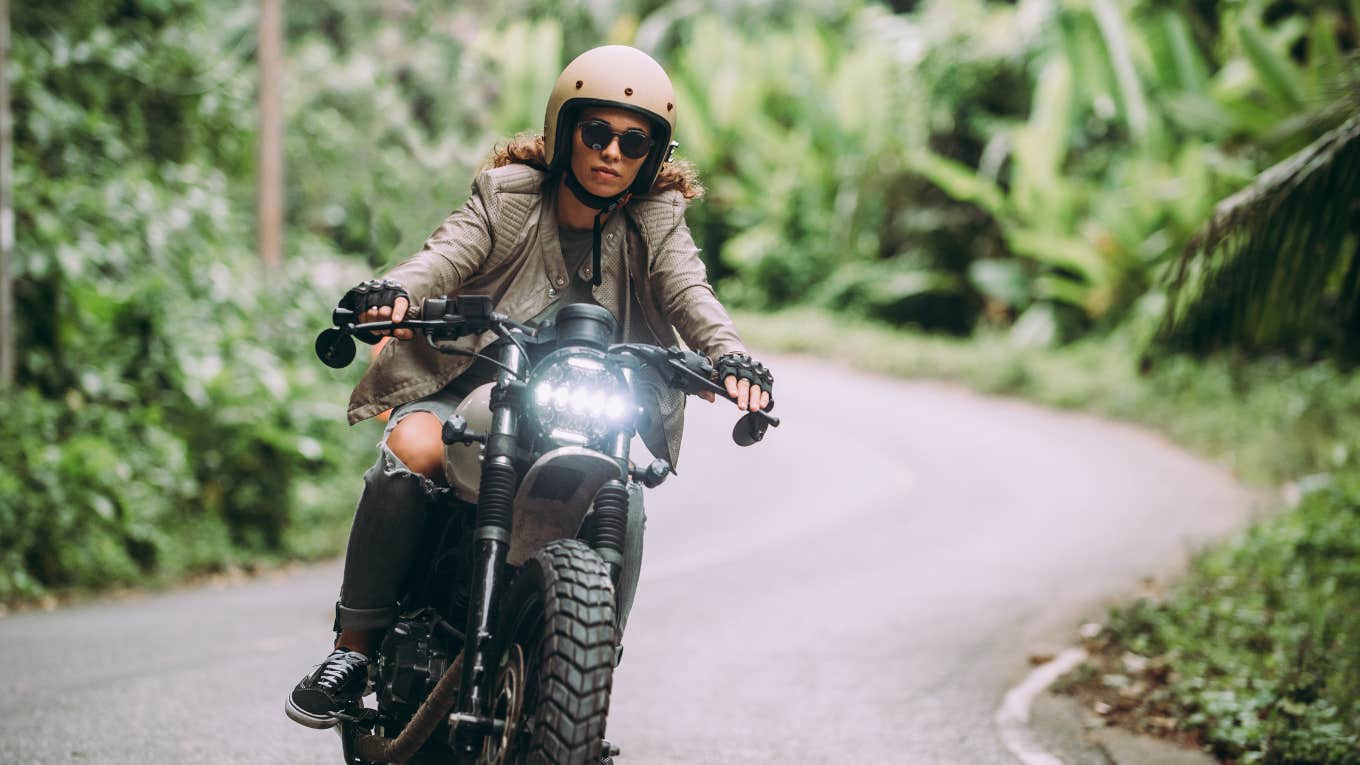 Woman Claims Intoxicated Off-Duty Cop Was Only Given A Traffic Ticket After He Reportedly Hit Her Sister Woman riding a motorcycle