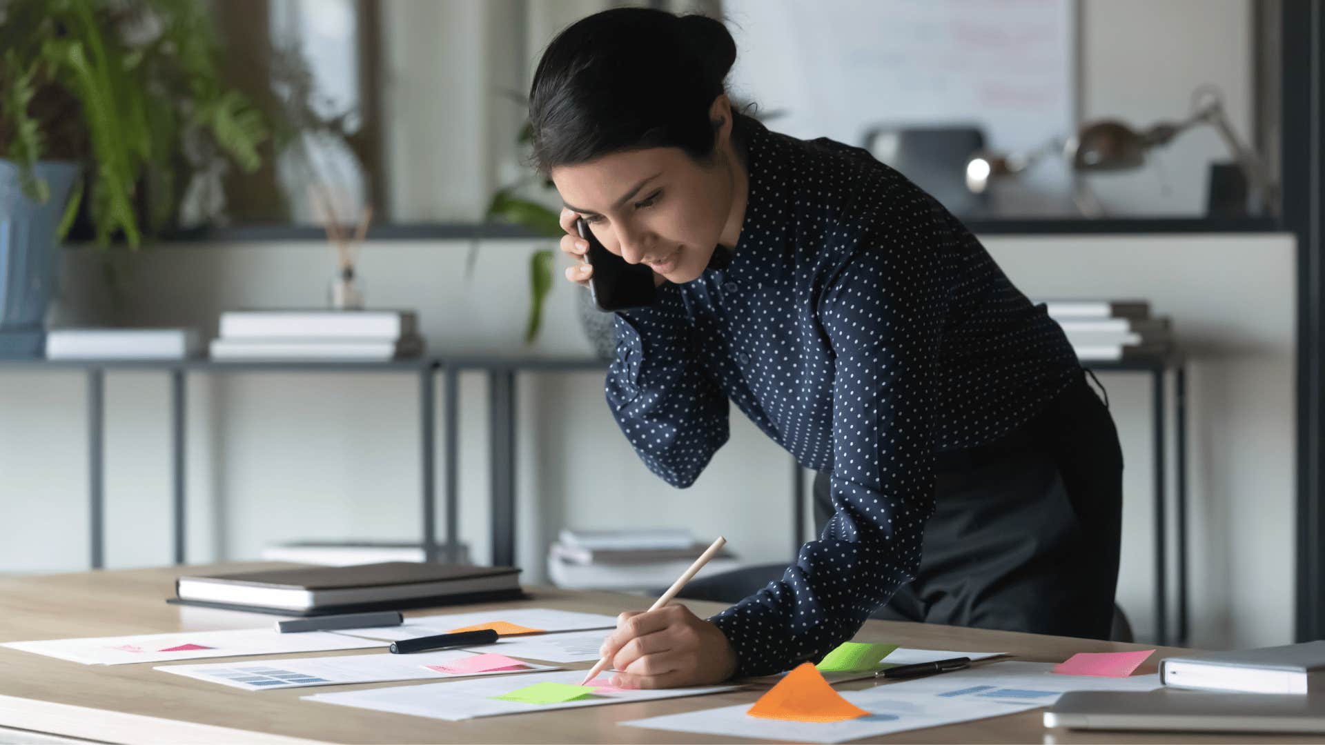 woman phone writing on stickies