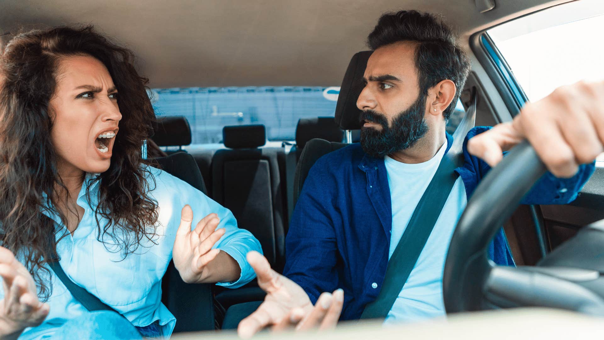 woman yelling at man driving