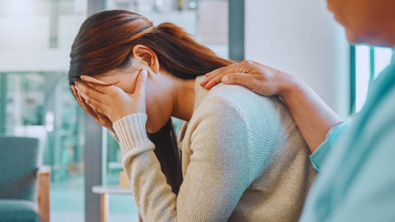 Man With Autism Explains Why He Struggles When He Sees People Cry man comforting crying woman