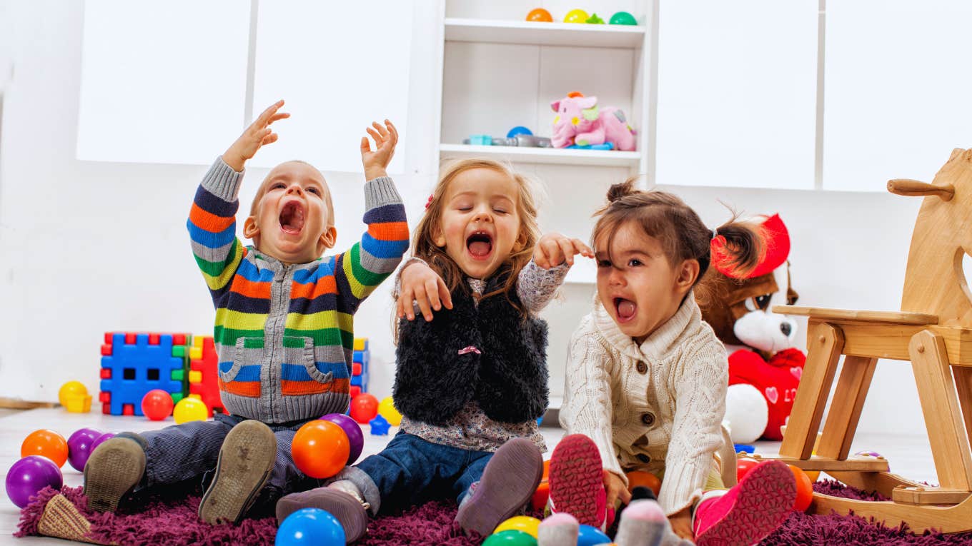 Daycare Employee Told To Come Into Work Despite Having Pink Eye three kids having fun at daycare