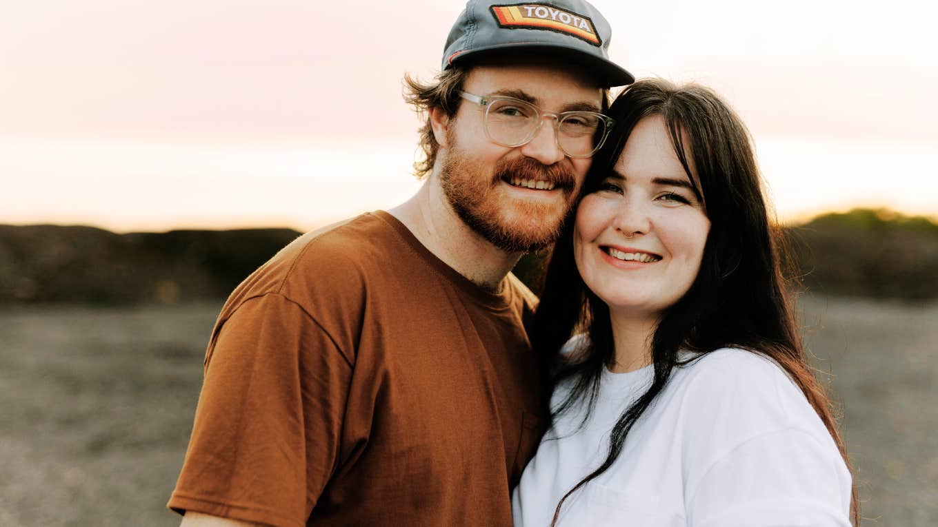 The Least Important Things You Should Look For In A Partner, According To Psychology Couple smiling together.
