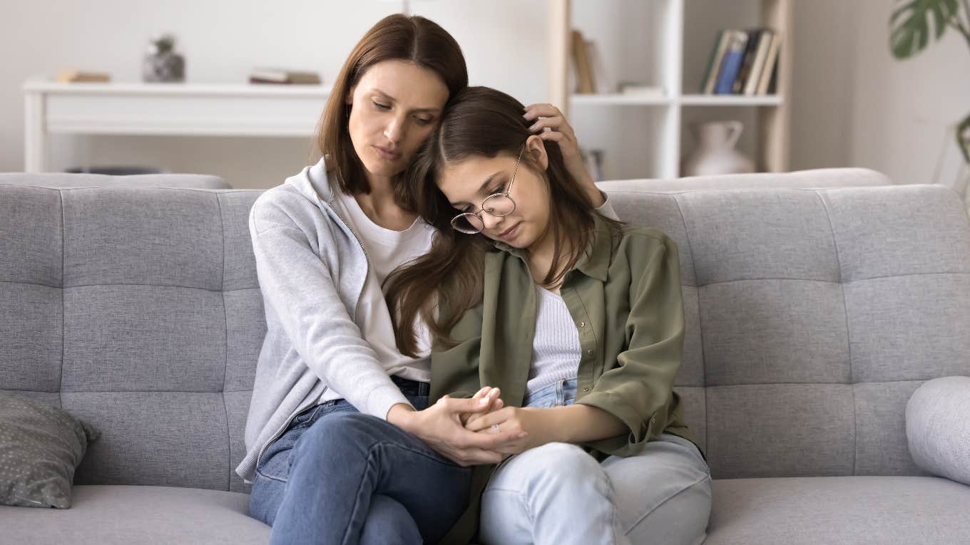 Mom Wants To Charge A Boy Who Spit On Her 12-Year-Old Daughter With Assault Mom comforting daughter