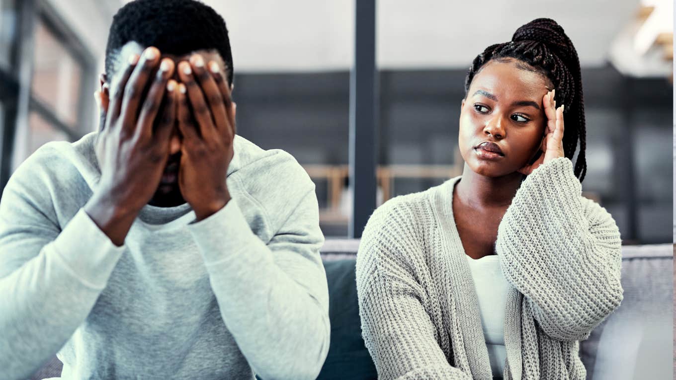Common Money Mistakes That Tend To Cause Divorce, According To Psychology Couple having serious disagreement about money.