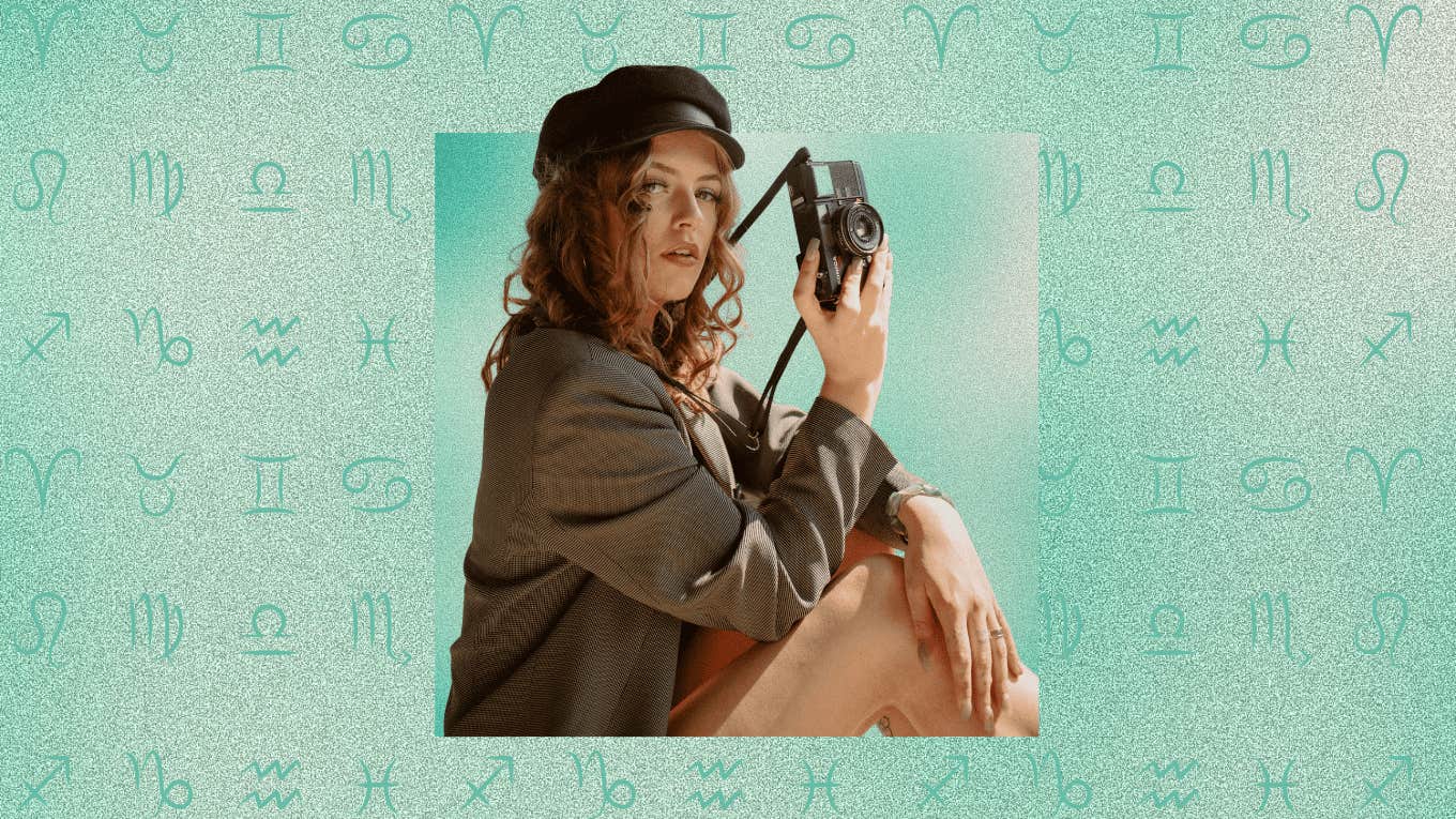 Most Talented Zodiac Sign woman with most talented zodiac sign holding camera