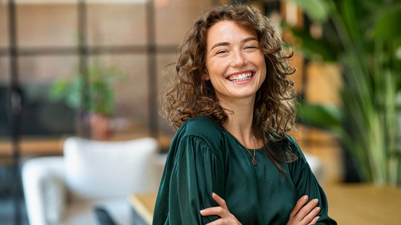 The One Trait Great Employees Without Emotional Work Attachments Have In Common Great employee smiling