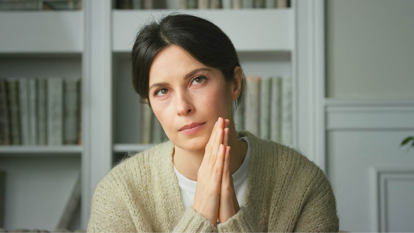 Phrases Women Use When They Can't Be Trusted, According To Psychology upset woman hands clapped