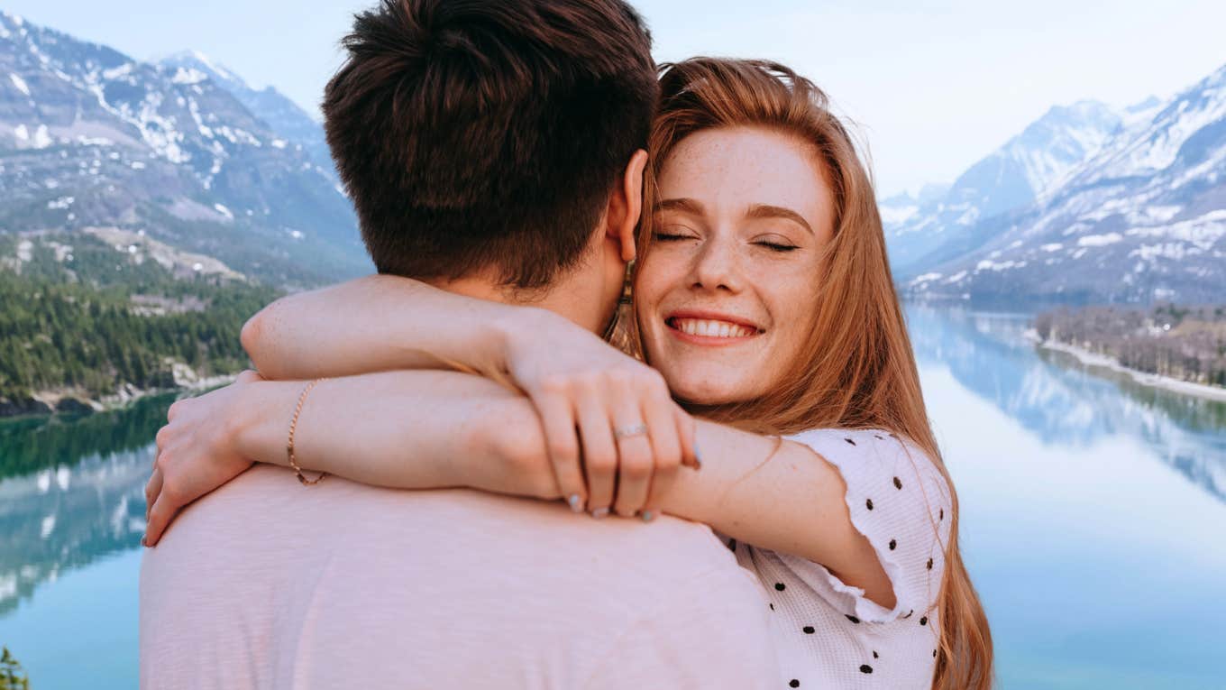 Most desirable quality in partners, according to research couple outdoors, embracing the most desirable quality in thier partner