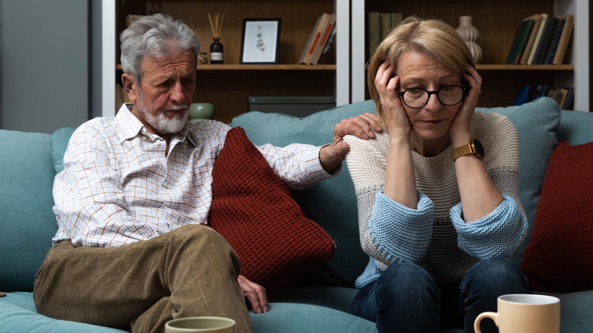 Adult woman looking frustrated next to her husband.