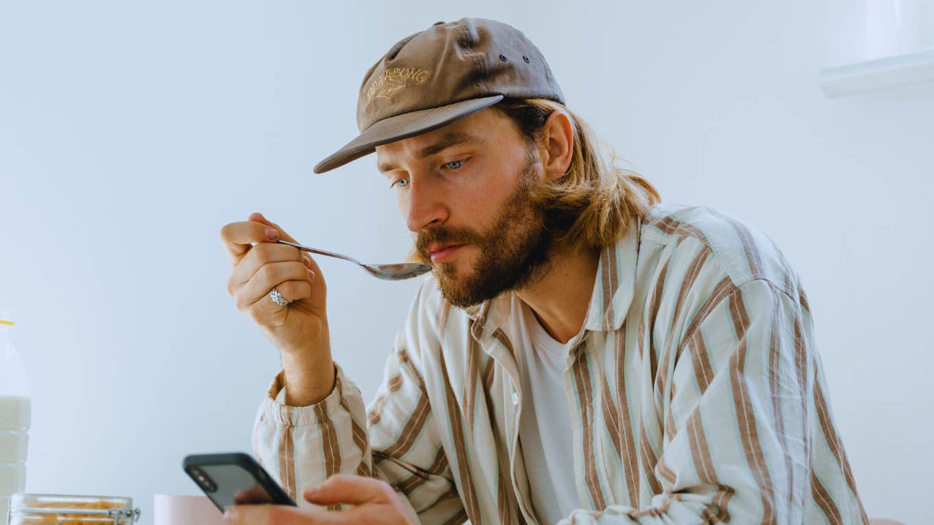Eating This Snack May Increase Cancer Risk By 50%, According To Research Man realizes while eating a snack that it could increase cancer risk.