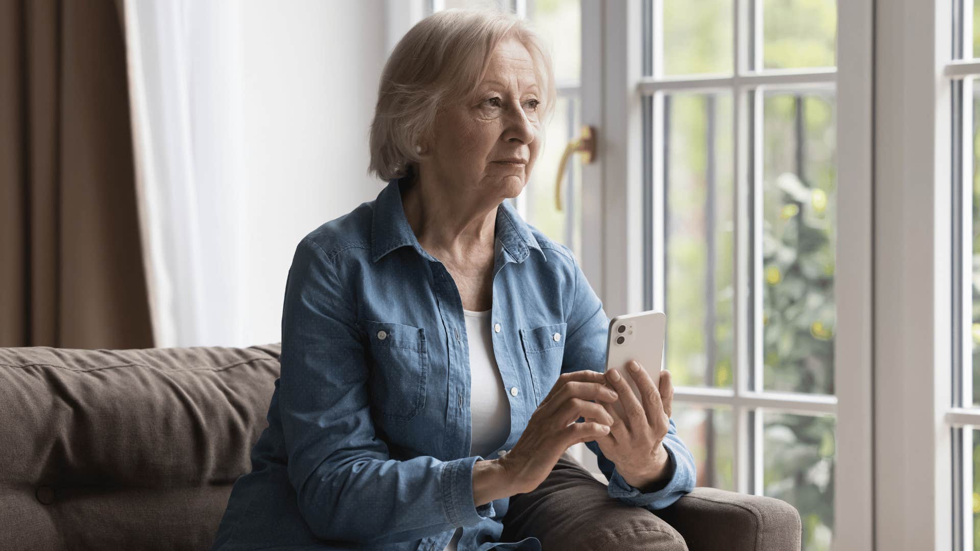 older woman feeling pressure to meet unrealistic beauty standards