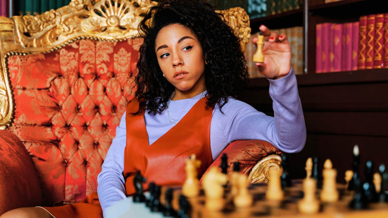 You Have Two Choices In Life — The Most Successful People Choose This One Woman playing chess with life choices.