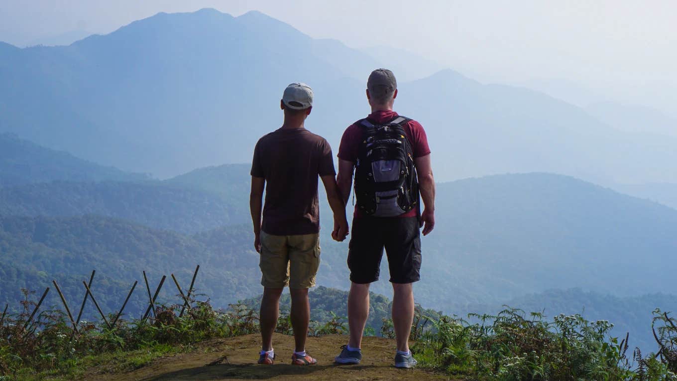 Woman's Boyfriend Blames The Emotional Effects Of Altitude For Why He Cheated On Her With A Man Gay couple on high altitude mountain