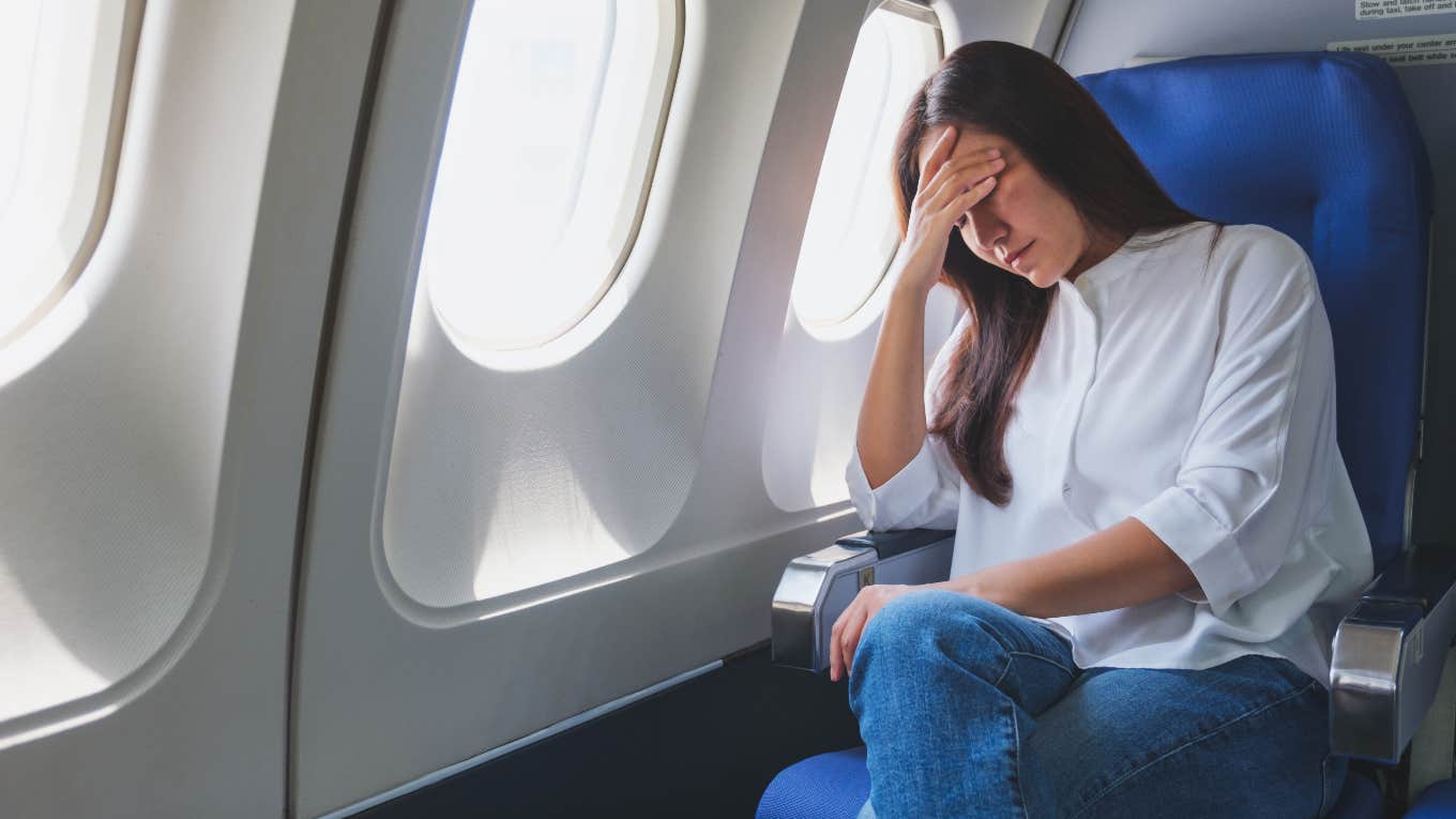 Airline Ignores Surgeon’s Request For A Refund After Giving Up Her Business Class Seat To Assist In A Medical Emergency Annoyed woman on airplane