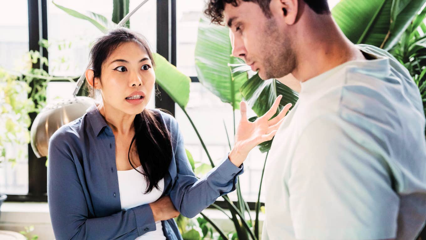 Ways To Control Your Temper (So Your Marriage Doesn't Become Explosive), According To Experts Couple in argument needing to control temper.