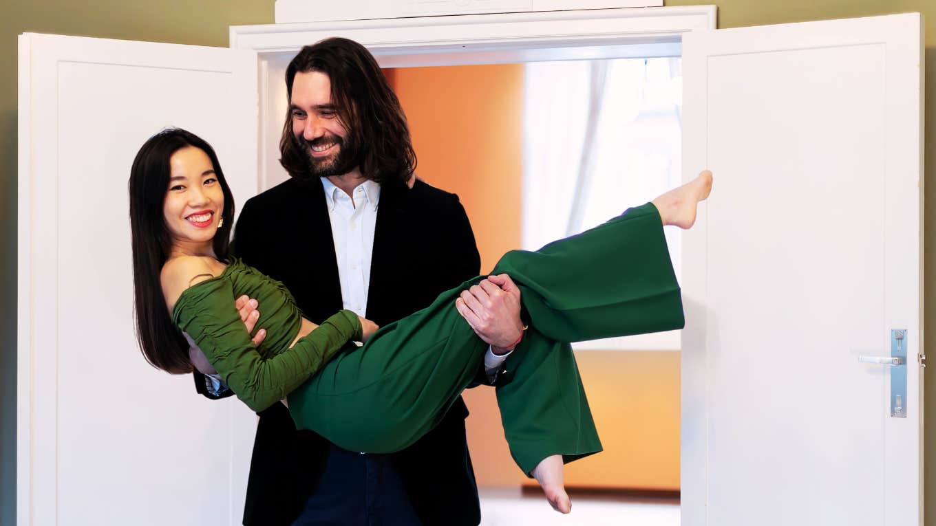 Couples With These Habits Stay Flirty For A Lifetime Flirty couple walking into a room after a romantic date.