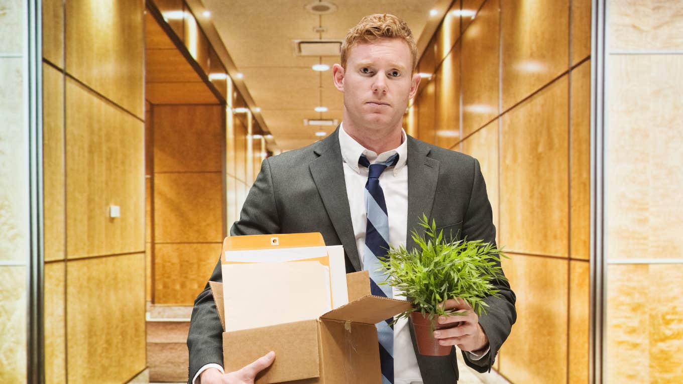 Employee Fired After Joking With Co-Workers That He Hid In The Bathroom During Shift fired employee walking out of office with belongings