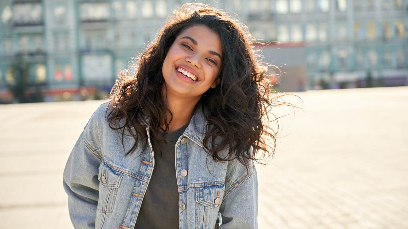 People Share The Incredibly Simple Habits That Have Significantly Improved Their Lives Happy woman who improved her life with simple habits