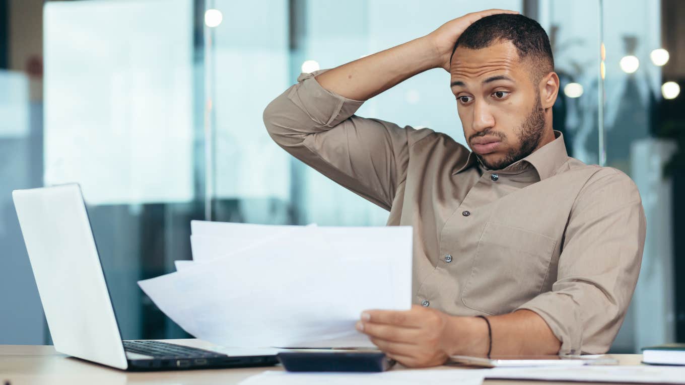 Missouri Manager Posts Incomprehensible Letter To Staff Upset With The Lack Of Shift Breaks Employee reading incomprehensible letter posted by Missouri manager