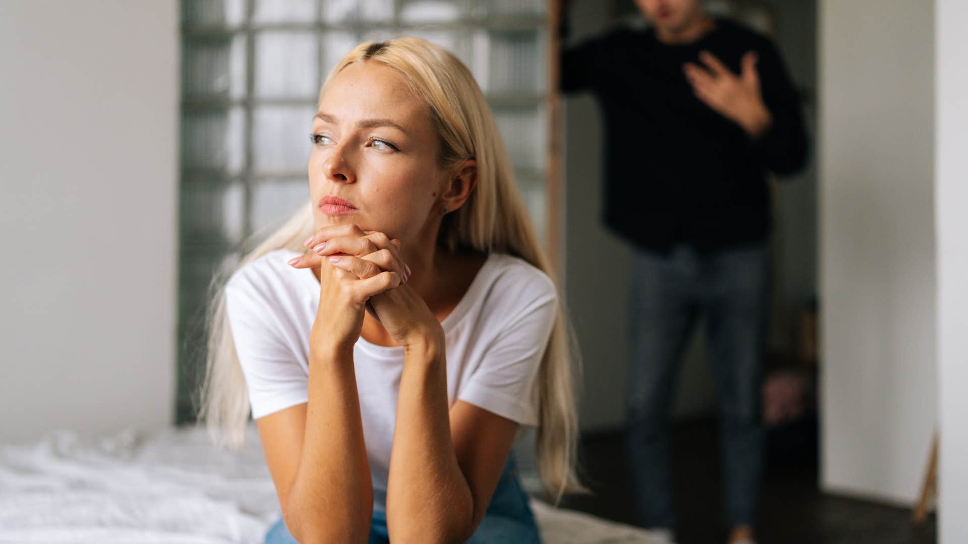 Woman looks away from her partner.