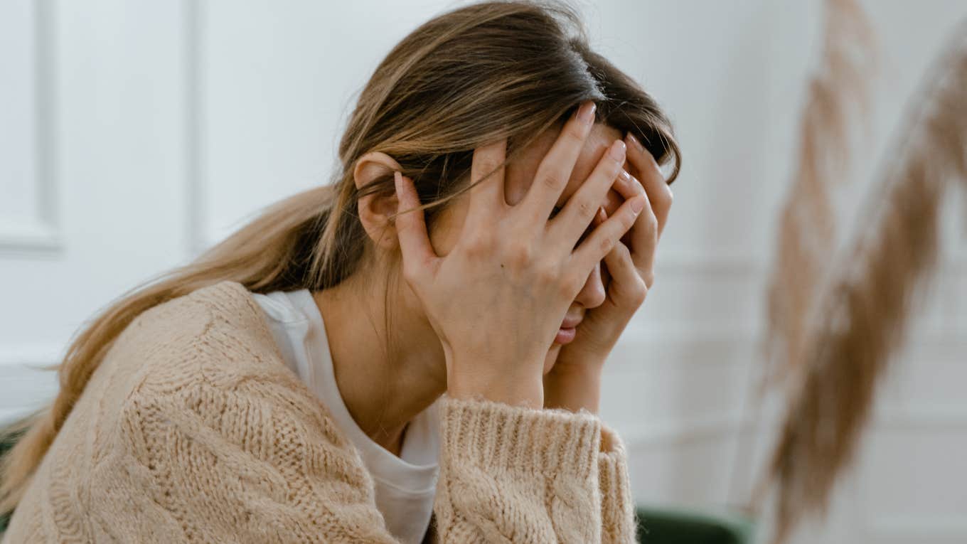 Sad Signs Someone Is Suffering From Post-Romantic Stress Disorder Sad woman suffers with post-romantic stress disorder.