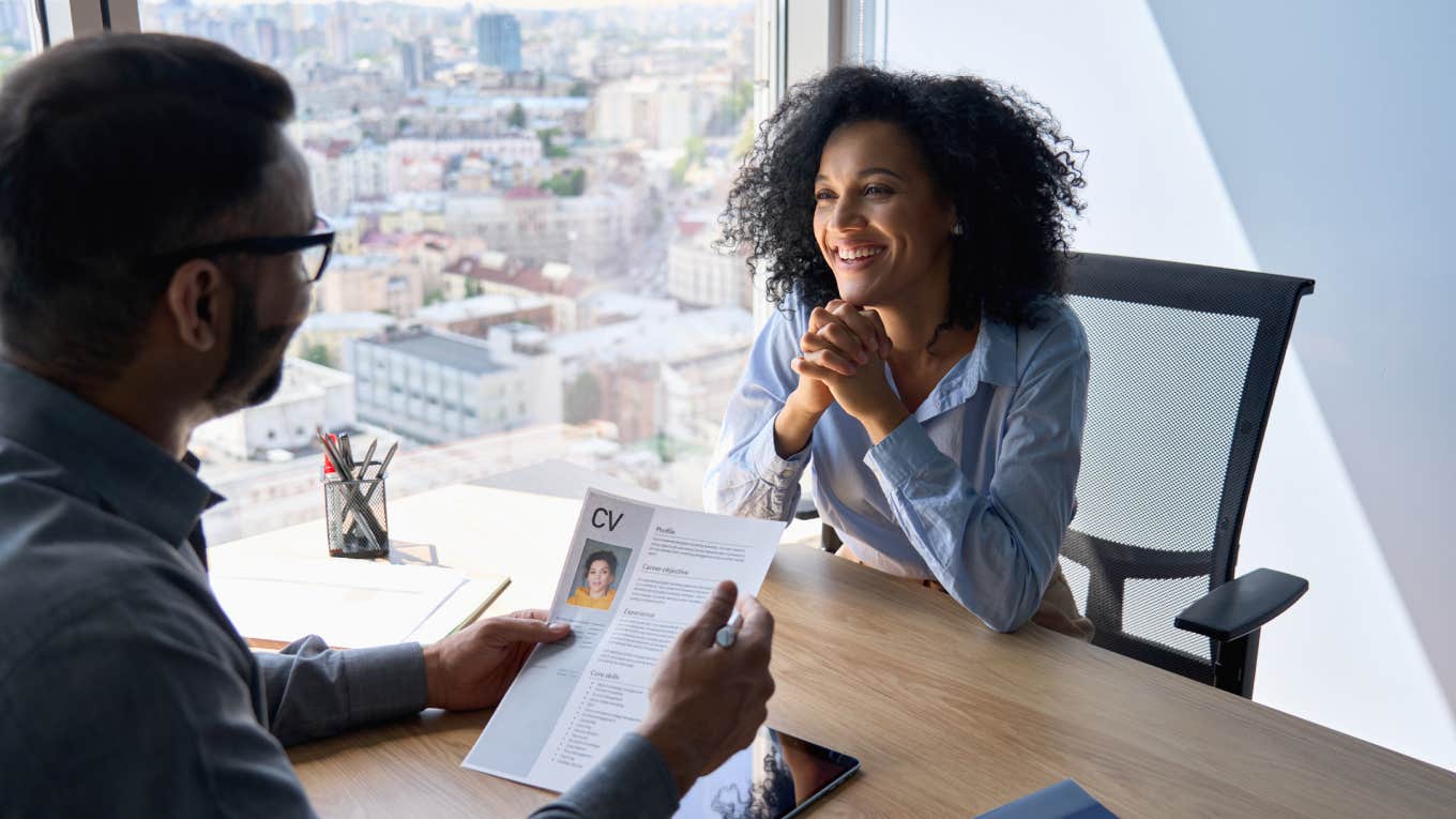 Recruiter Tells Applicant She Wasn't Hired Because She Asked Too Many Questions About Money manager interviewing young woman in office