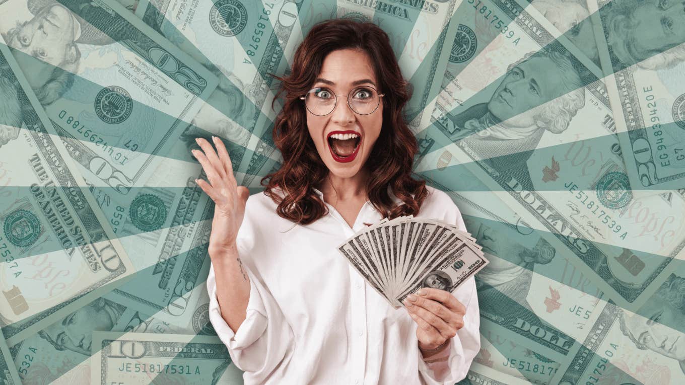 Biggest Sign You're About To Quantum Leap Your Income woman holding money in vortex sign quantum leaping income