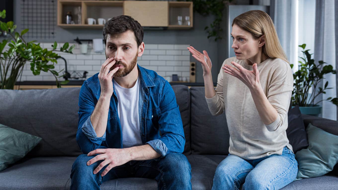 Signs You're Married To A Stubborn Man Who Will Never Change woman upset at man sitting silently