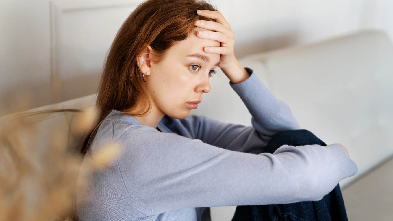 The Silent Strain: How Anxiety Sneakily Manifests In Your Body Anxious woman feeling tense in body.