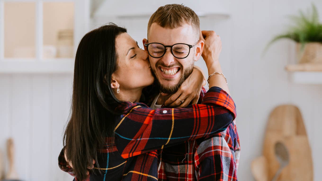 Psychology Says There's Things That End A Man's Attraction To You, No Matter How Beautiful You Are Woman being overly lovey towards boyfriend.