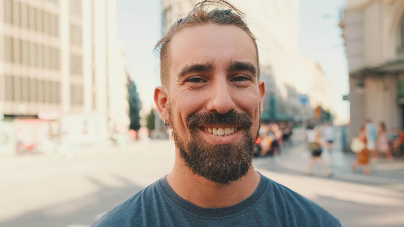 Things A Man With Good Morals Simply Won't Do, According To Psychology happy smiling man with a beard
