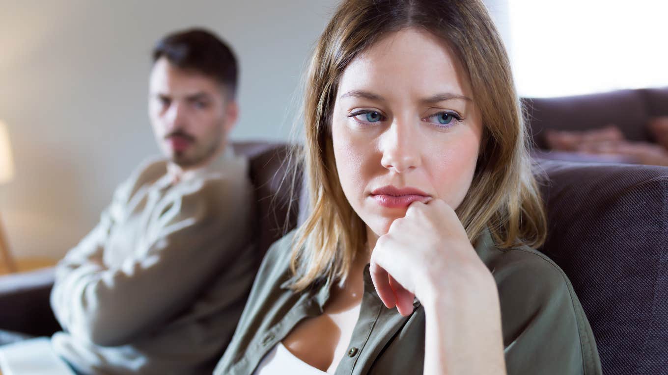 Things Millennial Wives Want From Their Marriages That They're Not Currently Getting unhappy millennial wife next to husband