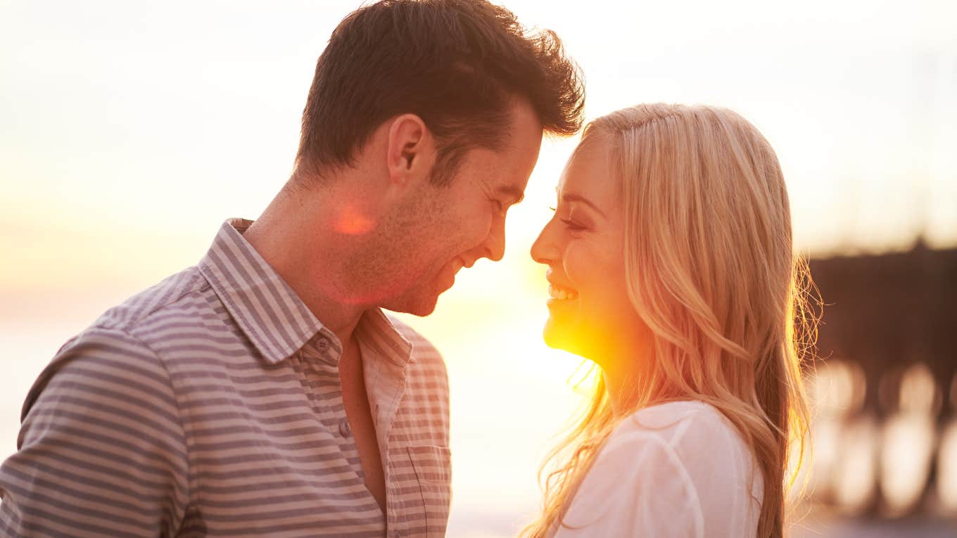 Subtle Ways Strong Women Can Let Men Know They're Interested — Without Scaring Them Off Strong woman lets man know she is interested.